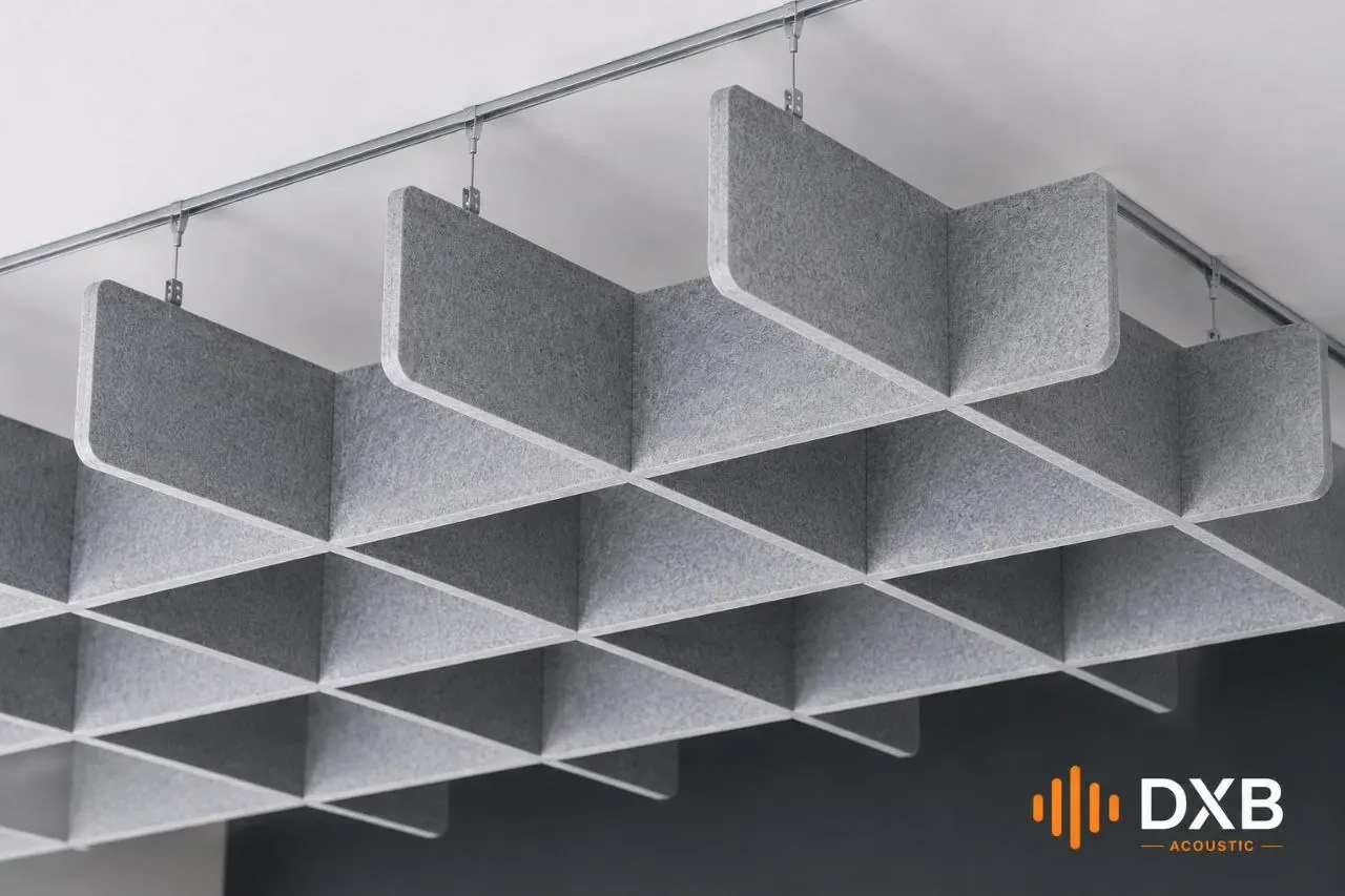 Grid baffle acoustic ceiling over an open-plan office