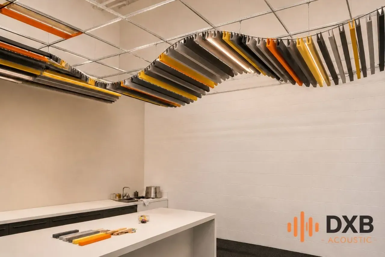 Suspended vertical acoustic baffle ceiling over a kitchen